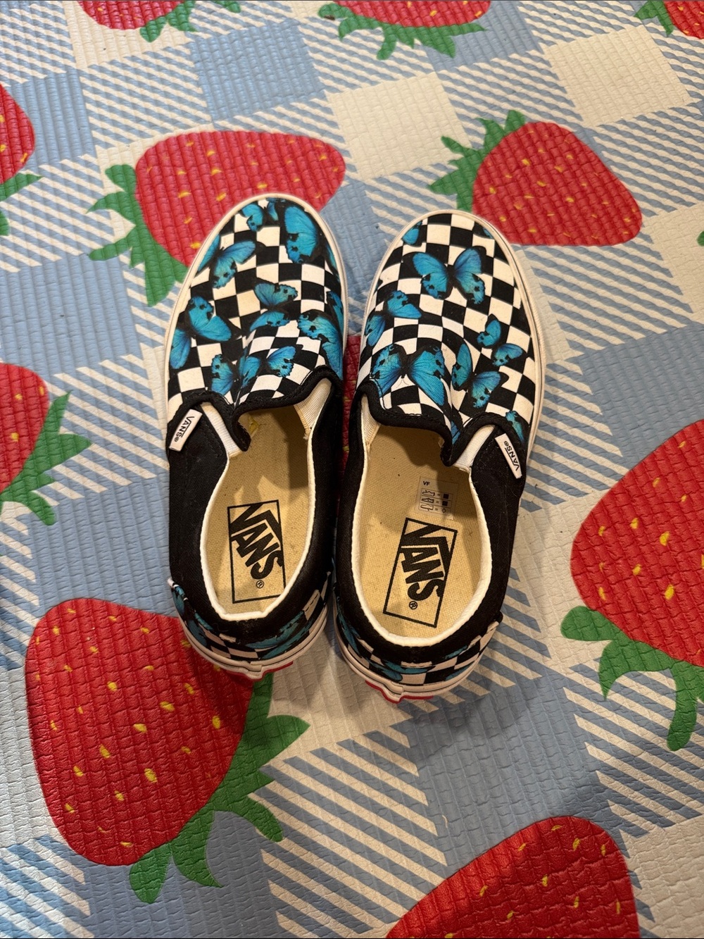 Vans Kids Black & White Checkerboard Slip-On Sneakers with Blue Butterflies